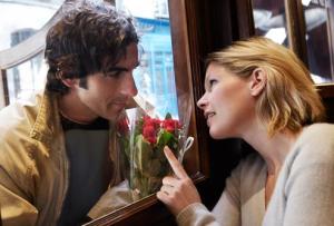 382782775_man_giving_woman_flowers (1)